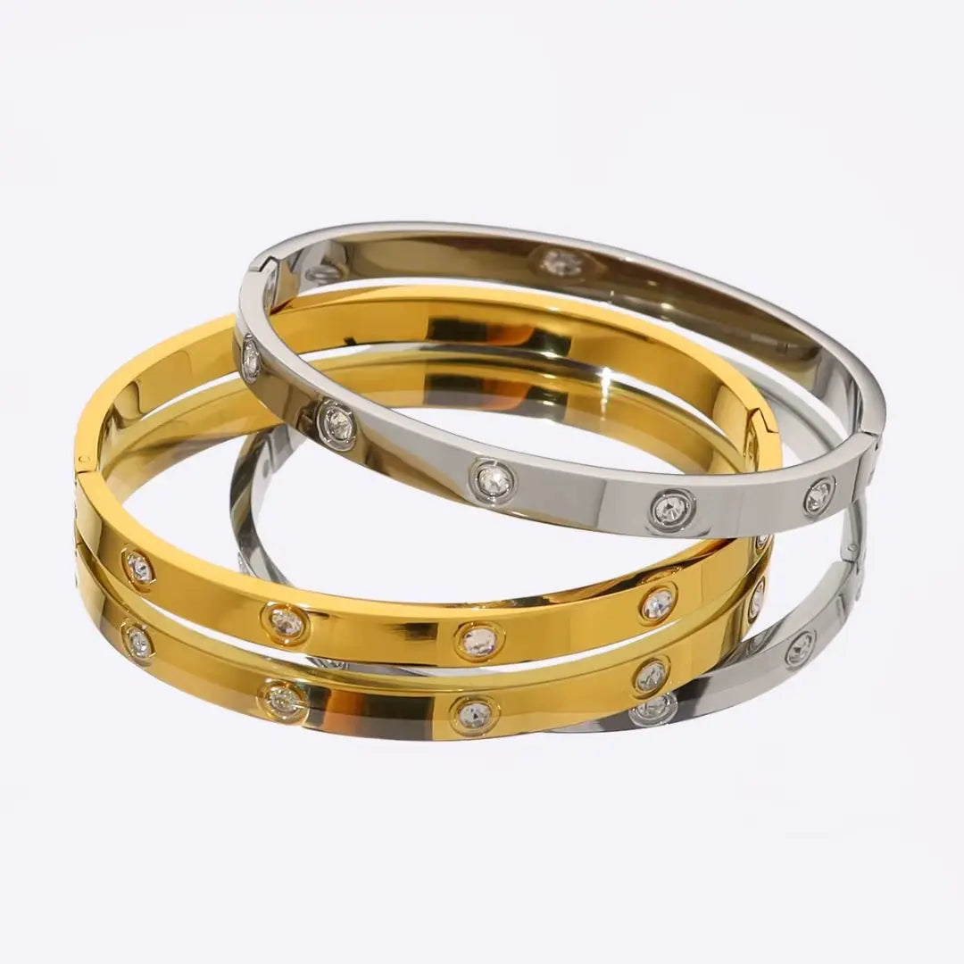 pulsera cinco cristales en oro 18k