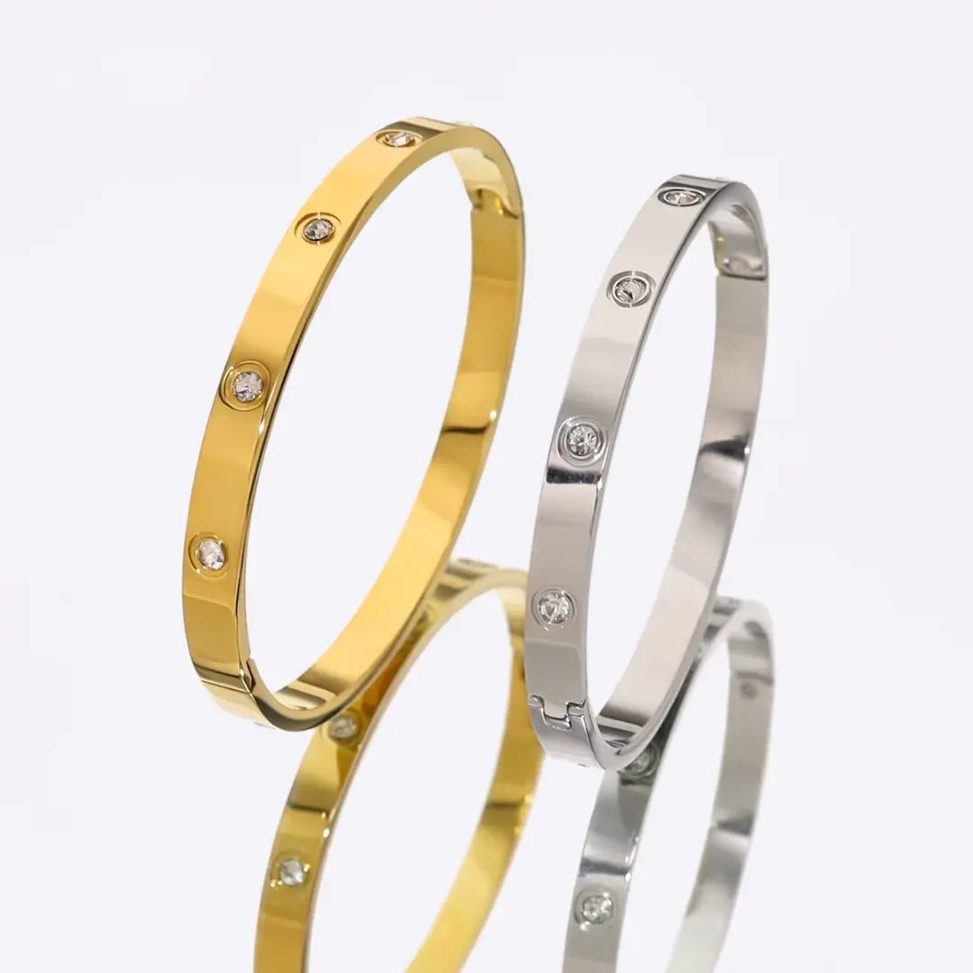 pulsera cinco cristales en oro 18k