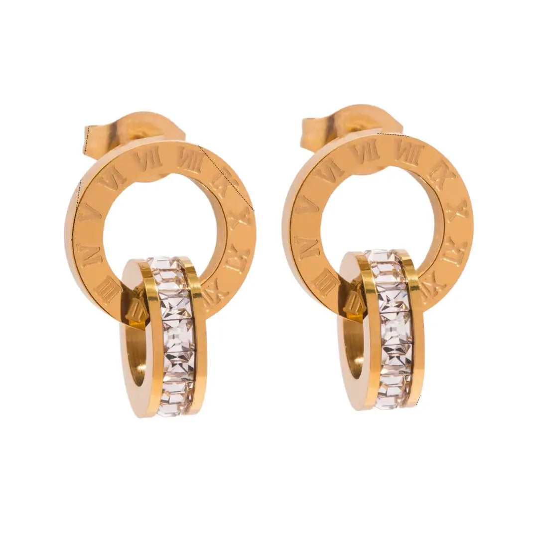 Conjunto de pendientes y collar de cristal con números romanos
