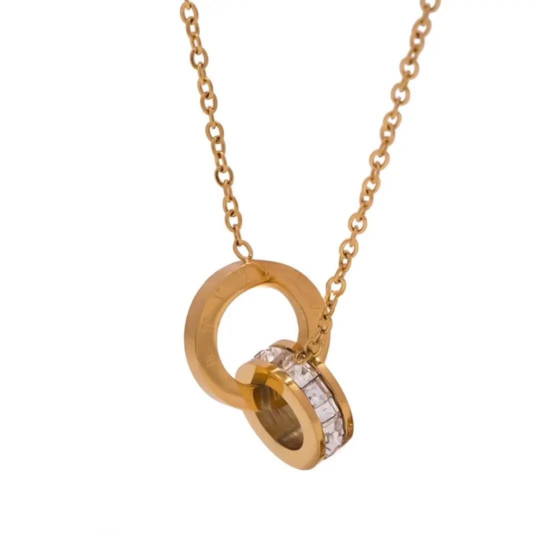 Conjunto de pendientes y collar de cristal con números romanos
