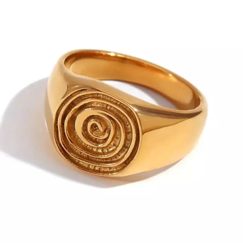 Anillo de sello caracol en oro 18k