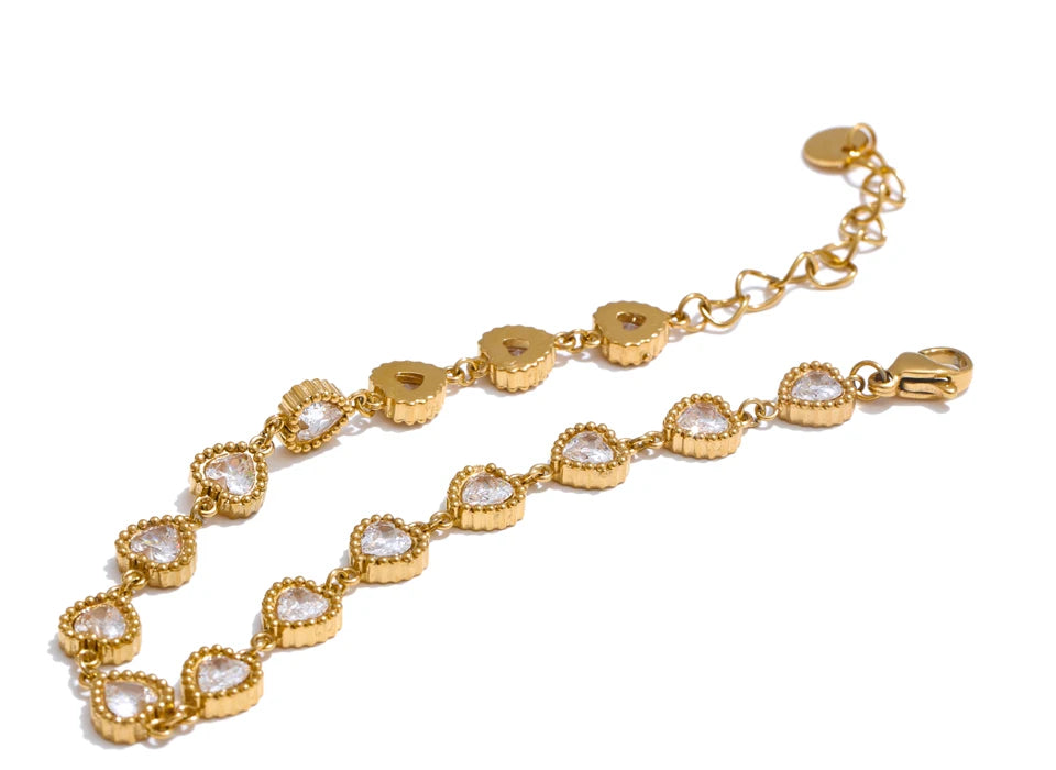 Pulsera corazones con cristales en oro 18k