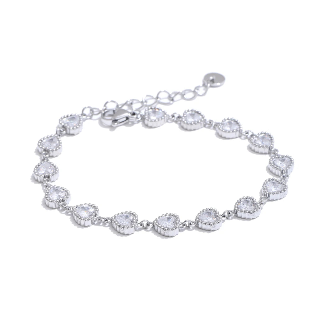 Pulsera corazones con cristales en oro 18k