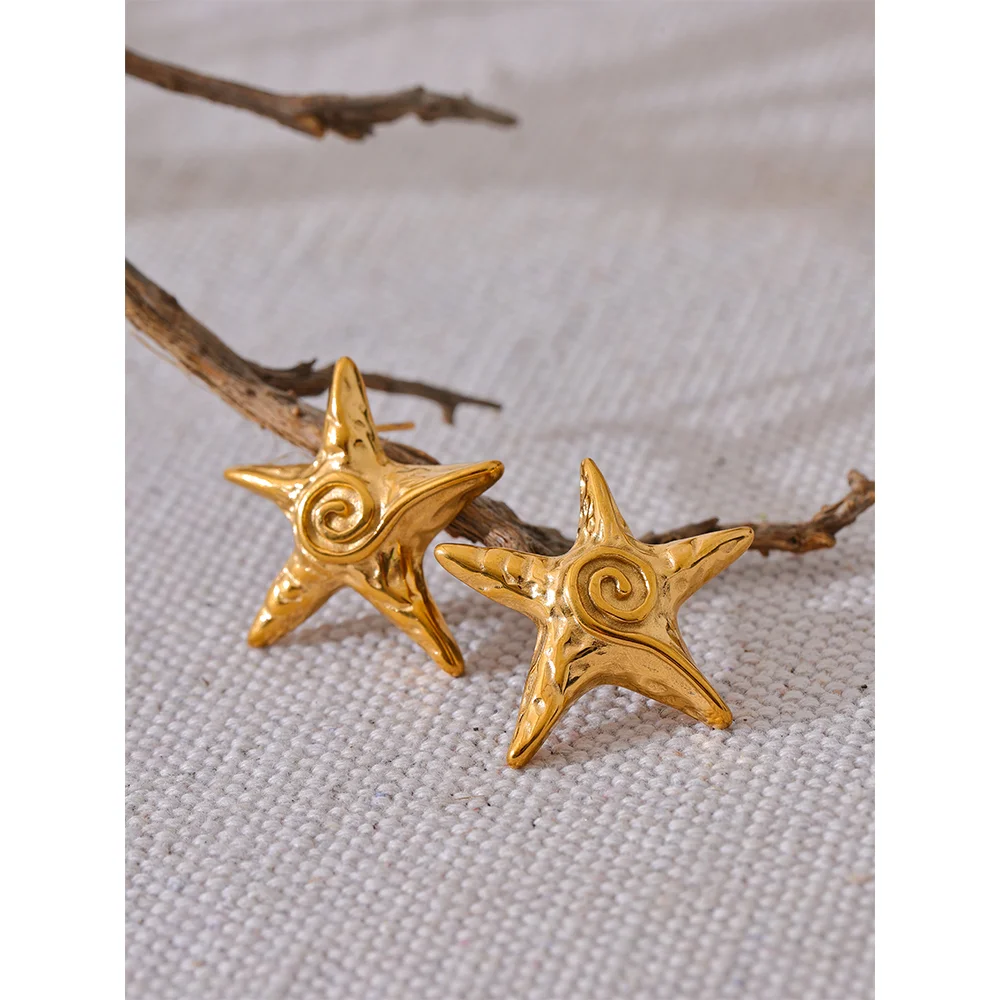 Pendientes estrella de mar en oro 18k