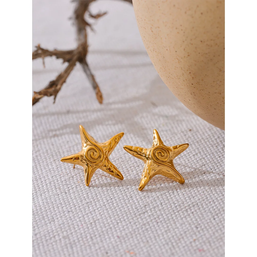 Pendientes estrella de mar en oro 18k
