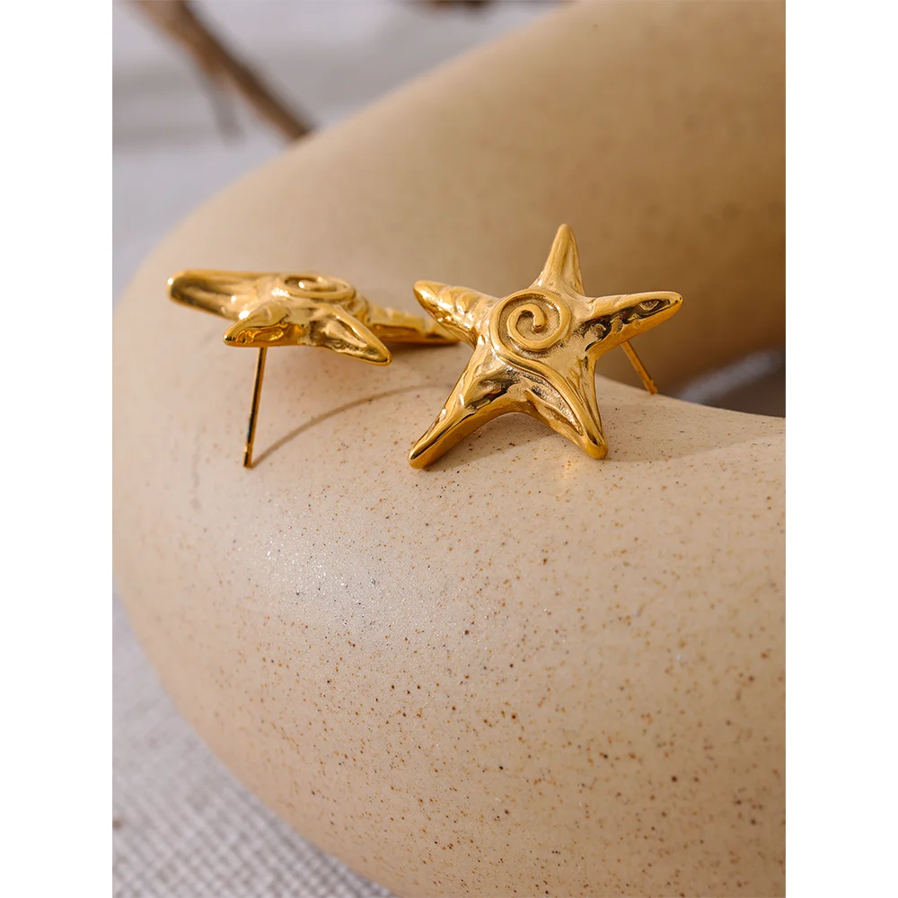 Pendientes estrella de mar en oro 18k