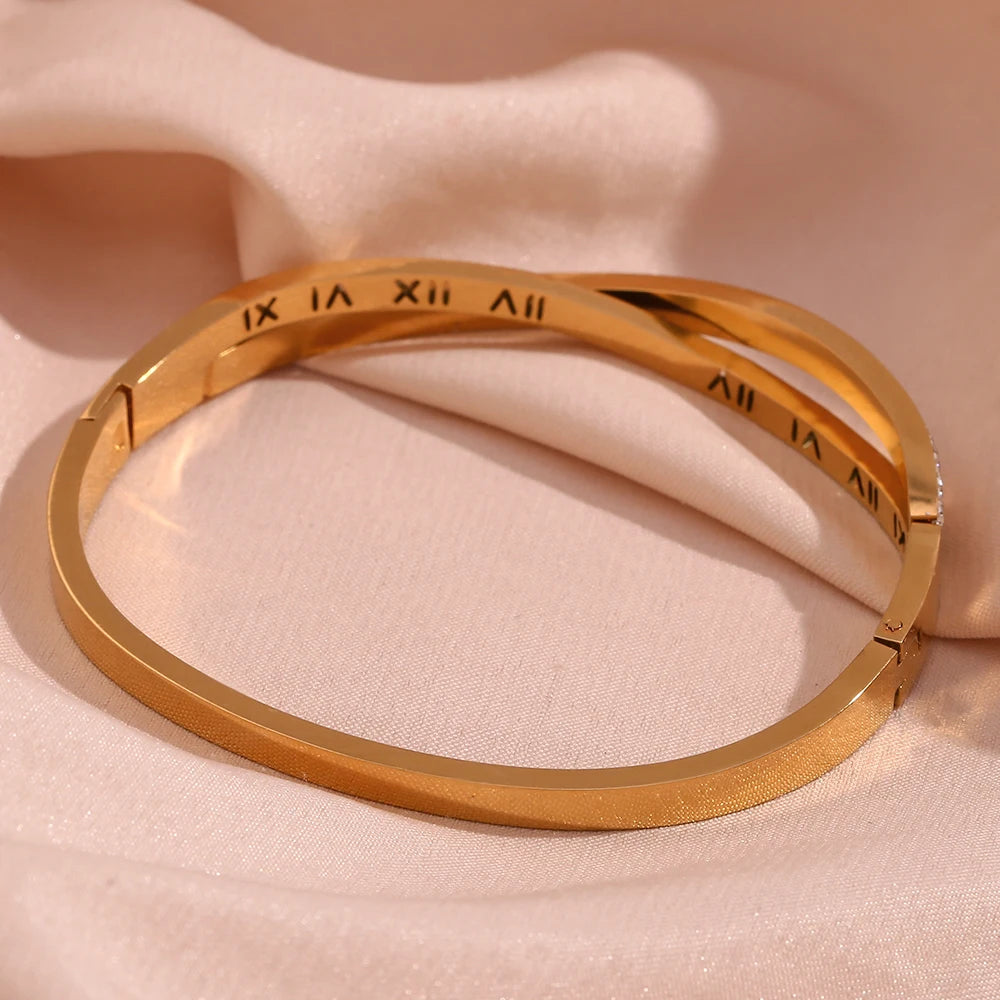 Brazalete romano cruzado en oro 18k