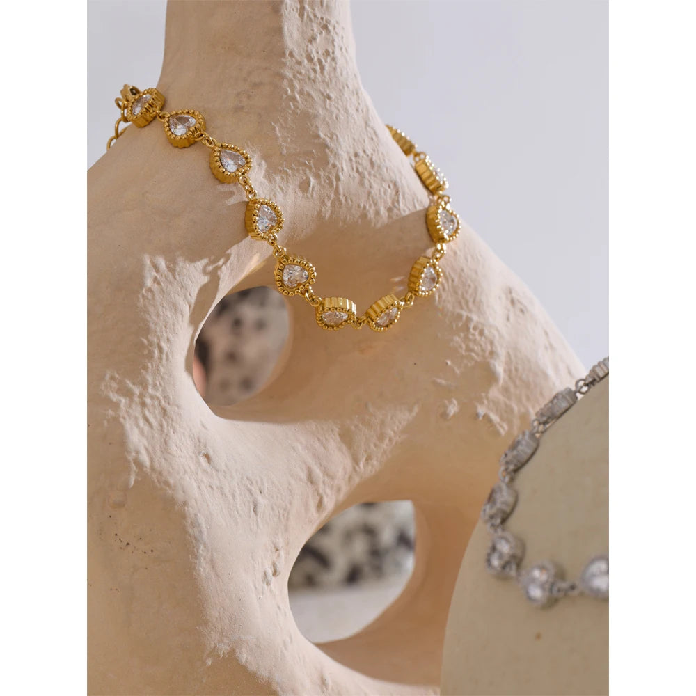 Pulsera corazones con cristales en oro 18k