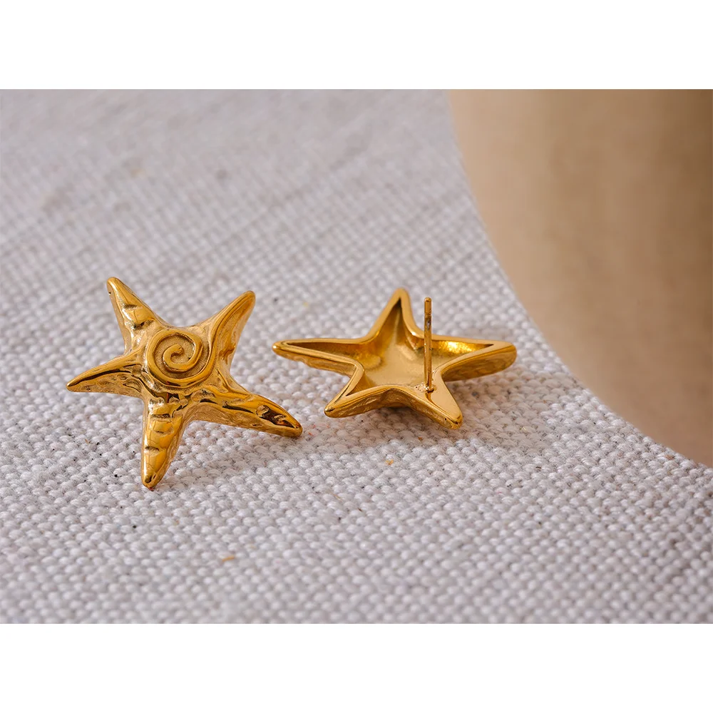 Pendientes estrella de mar en oro 18k