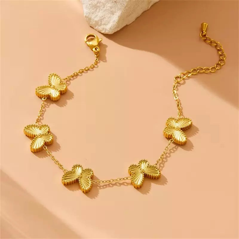 Pulsera cinco mariposas