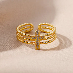 Anillo de cruz con cristales
