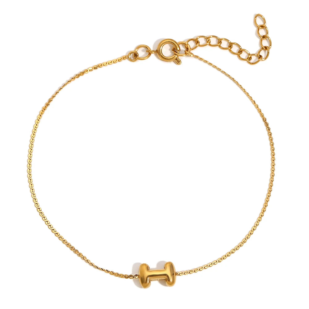 Pulsera con letra inicial en oro 18k para mujer