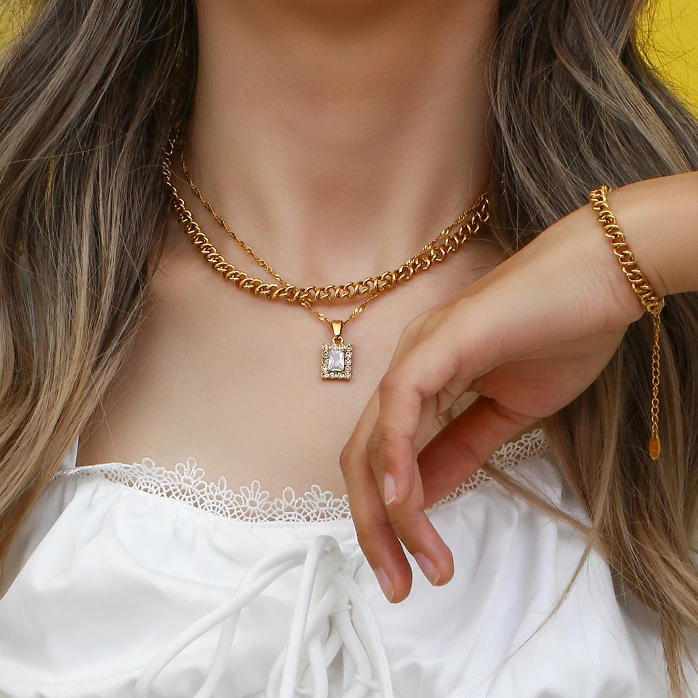 Conjunto - Collar y pulsera de cadena dorada con ondas curvas